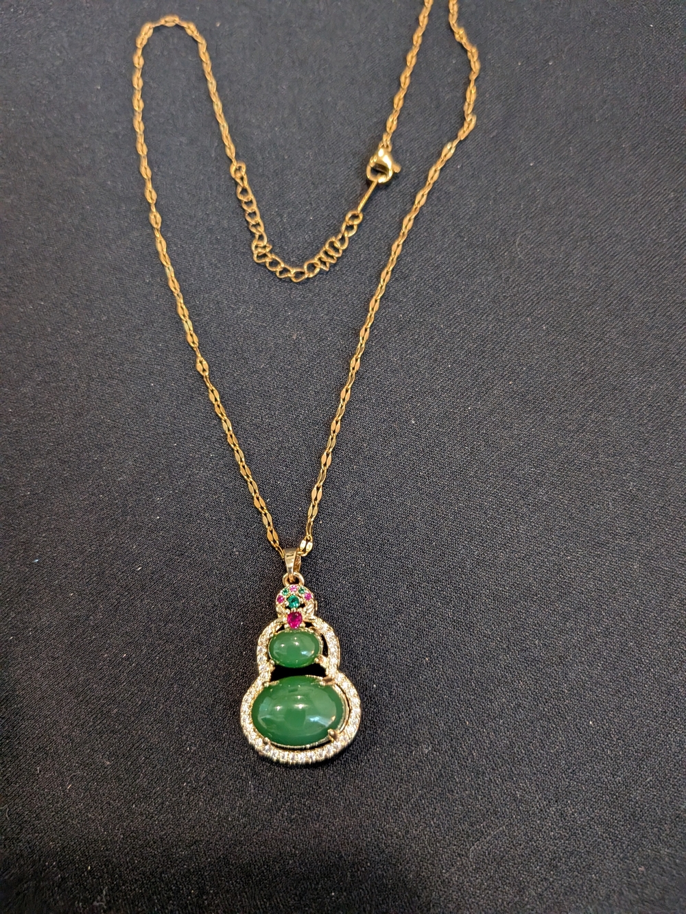 Gold Tone Necklace with Green Gemstone Pendant